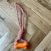 Přetahovadlo pro psy s gumovou kostí a pevným lanem, 31 cm, oranžové